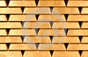 Gold bullion wall texture. Gold bullion background, pattern photo