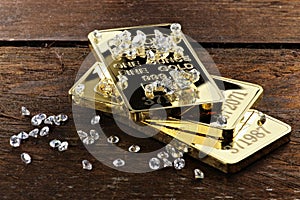 Gold bullions with diamonds photo