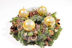 Gold candles on wreath