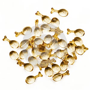 Gold capsules with serum for face.