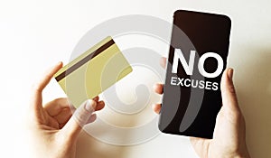 Gold card and phone with text disaster recover plan No Excuses in the female hands