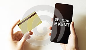 Gold card and phone with text disaster recover plan Special Event in the female hands