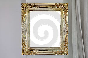 gold carved wooden picture frame isolated on white