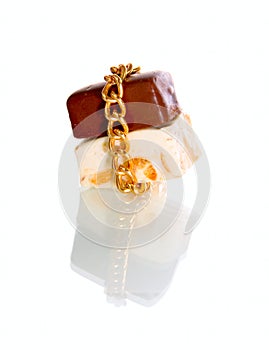 Gold chain and chocolate candy