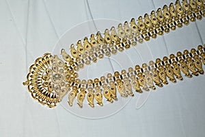 Gold chain on white background
