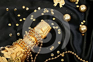 Gold Champagne bottle with confetti stars and party streamers
