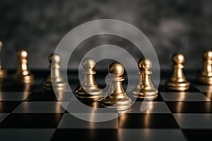 Gold Chess on chess board game for business metaphor leadership concept