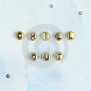 Gold CHILL OUT beads word typography photo