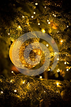 Gold christmas balls with christmas tree