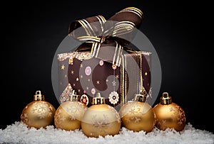 Gold christmas balls with snow