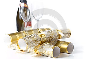 Gold christmas crackers with champagne & glasses