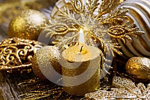 Gold christmas decoration with candle