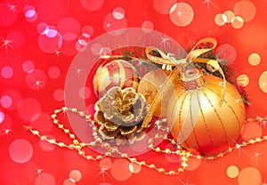 Gold Christmas decorations over red