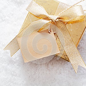 Gold Christmas giftbox with label