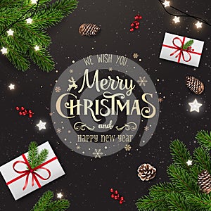 Gold Christmas and New Year Typographical on dark background with fir branches, gift boxes, pine cones, stars