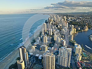 GOLD COAST, AUSTRALIA - APRIL 25, 2021: Aerial panorama view of High-rise building sky scrapers in Surfer Paradise beach city