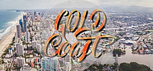 Gold Coast elegant lettering over aerial landscape of  Gold Coast city and Nerang river in Queensland, Australia.