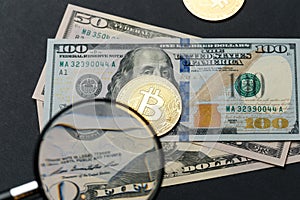 The gold coin of bitcoin lies on on American dollar bills. Online payment technology, digital wallet, computer financial, cryptocu