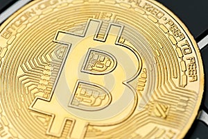 The gold coin of bitcoin lies on the laptop keyboard. Online payment technology, digital wallet, computer financial, cryptocurrenc