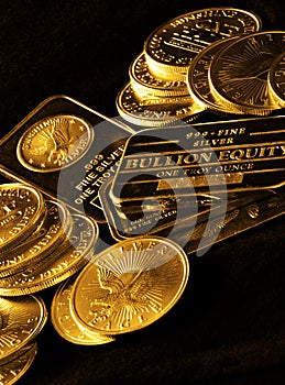 Gold Coins and Bars for Wealth photo