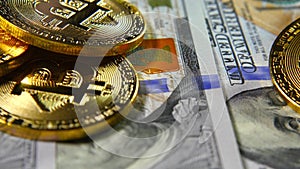 Gold coins bitkoyn on paper dollars. Virtual currency. Crypto currency. New Virtual Money Dollars