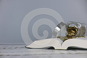 Gold coins on book. Finance and education concept. copy space for text or logo