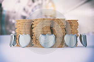 Gold coins protected by shields