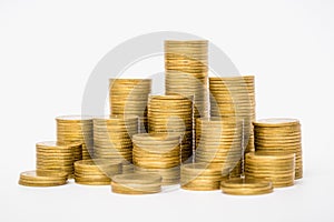 Gold coins stacks isolated on white background