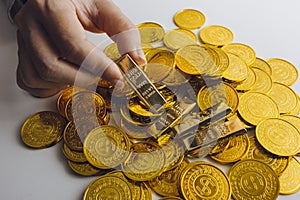 Gold coins stacks is representing riches and wealth management. Coin stack growing and find out the way to get a return on