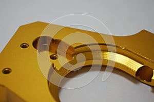 Gold color anodized aluminum parts texture design. CNC parts.