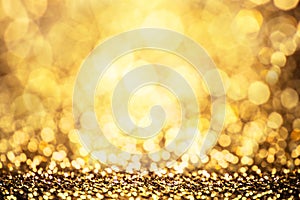 Gold color bokeh glitter background