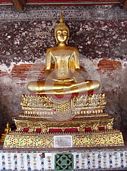Gold color Buddha statue in Buddhist temple