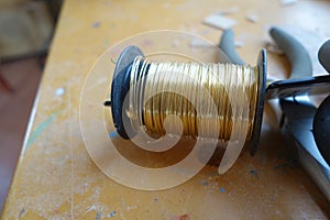 Gold color craft wire.