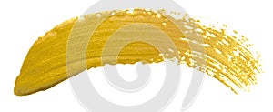 Gold color paint brush banner. Acrylic golden smear stroke stain on white background. Shine abstract detailed gold glittering text