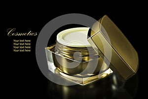 Gold colored blank cosmetic container for face cream moisturizer