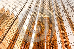 Gold colour office building tower facade in business center