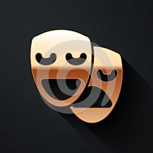 Gold Comedy and tragedy theatrical masks icon isolated on black background. Long shadow style. Vector