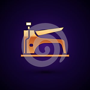 Gold Construction stapler icon isolated on black background. Working tool. Vector Illustration