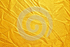 Gold creased fabric silk