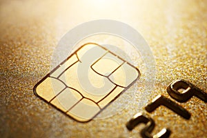 Gold credit card with micro chip selective focus