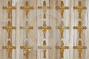 Gold cross background on weathered wood