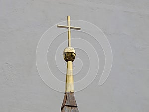 Gold cross on chapel tower photo