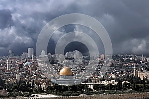 Gold cupola of Jerusalem before the thunderstorm.