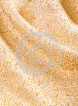 Gold damask with a shiny floral pattern