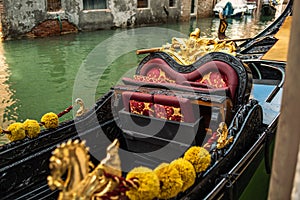 Gold decoration on the gondola. Detail Venetian Gondola Stern Detail or Ornament on the Grand Canal in Venice