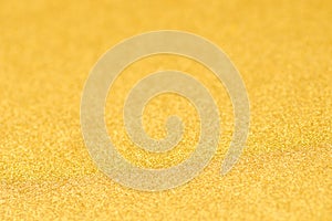 Gold defocused sparkling background texture