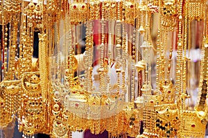 gold and diamond jewelry in a shop display in dubai