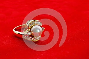 Gold Diamond Pearl Ring on Red Velvet