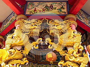 Gold dragon statues in Chinese religious venues