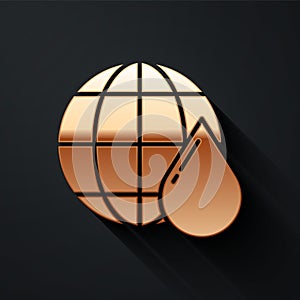 Gold Earth planet in water drop icon isolated on black background. Saving water and world environmental protection. Long